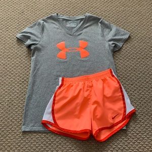 Orange Nike shorts;Under Armour shirt